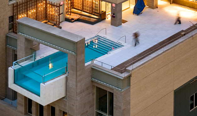 this architecturally daring pool designed by architexas sits atop the joule hotel in dallas texas ten stories above the ground the pool projects eight - Crazy Swimming Pools this architecturally daring pool designed by architexas sits atop the joule hotel in dallas texas ten stories above the ground the pool projects eight - Crazy Swimming Pools