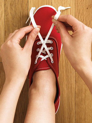 Holding The Shoe Laces In Hand Holding The Shoe Laces In Hand